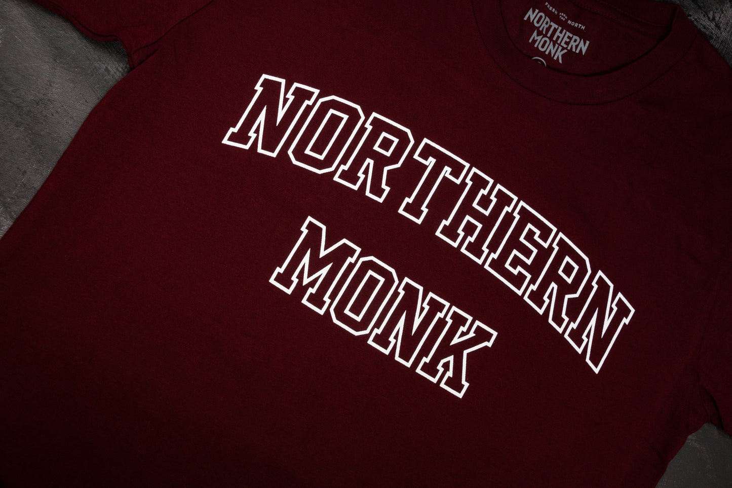 BURGUNDY VARSITY NORTHERN MONK TEE